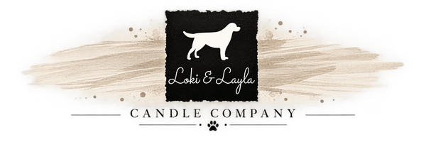 Loki and Layla horizontal logo featuring original white dog silhouette, black torn-edge square, subtle taupe brushstrokes, and Candle Company text