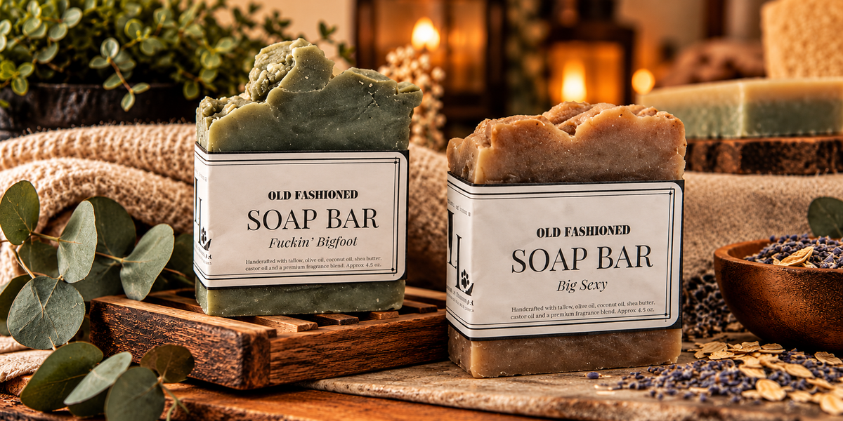 Loki and Layla Fuckin Bigfoot and Big Sexy handcrafted soap bars in a rustic botanical setting