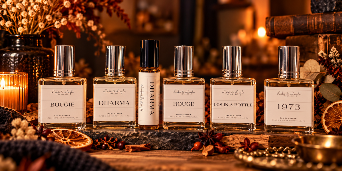 Loki and Layla fragrance collection with Bougie Dharma Rouge 90s in a Bottle and 1973 bottles in warm editorial setting